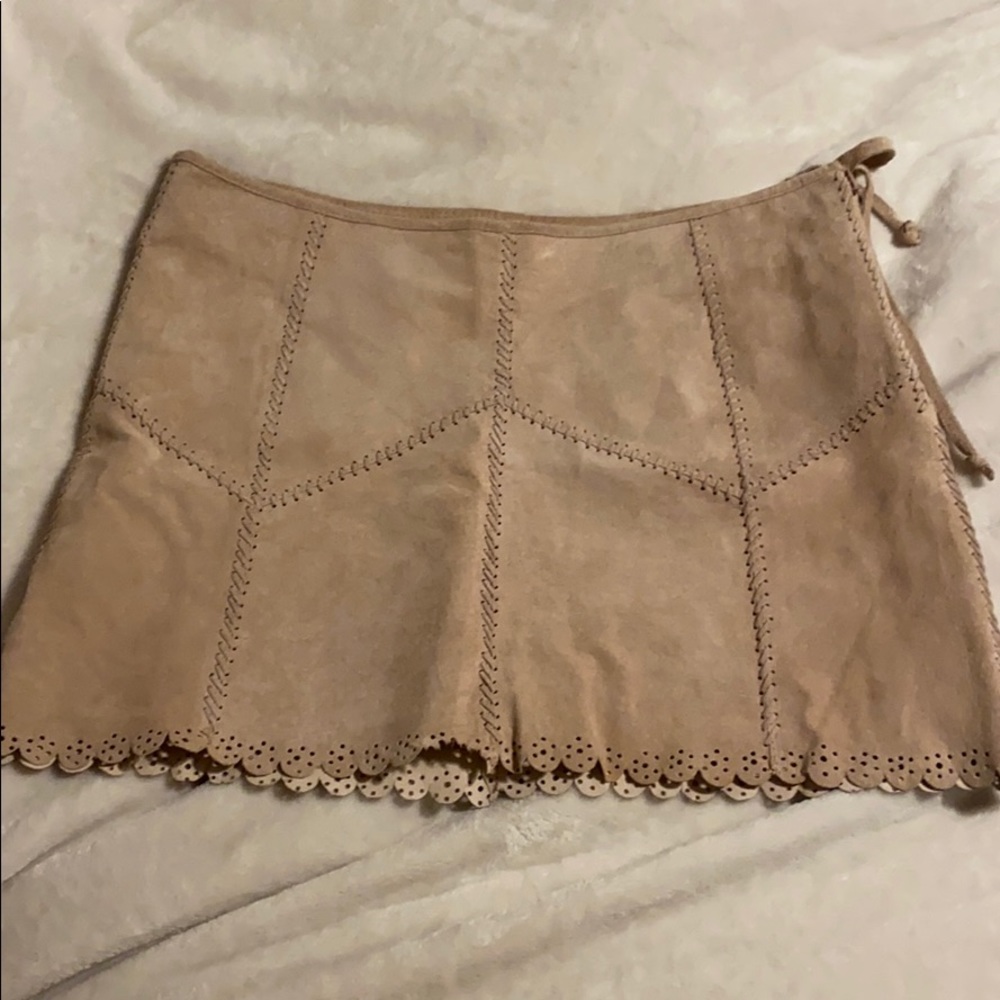 Light pink suede mini skirt